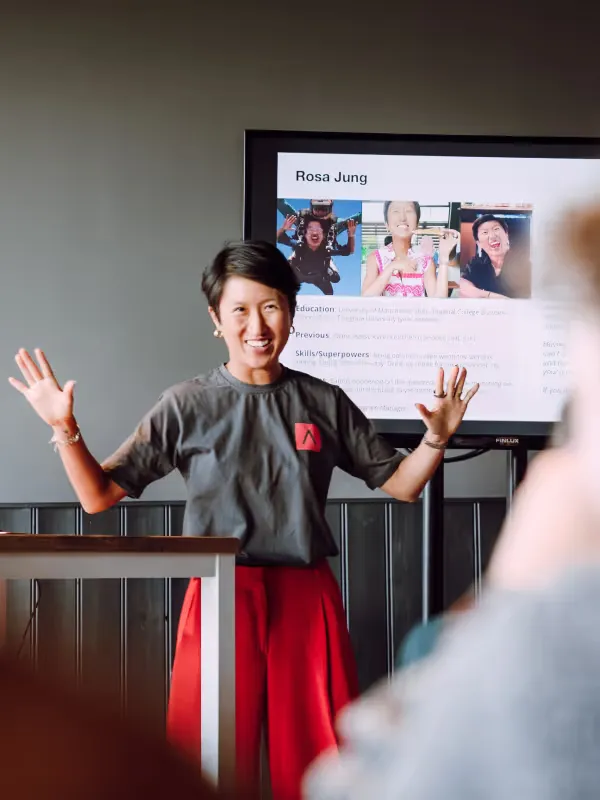 Female founder presenting ideas on powerpoint